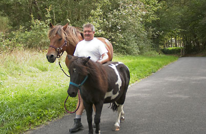 We saw this classic Frenchman walking his horses down a country road (David's France Gallery)